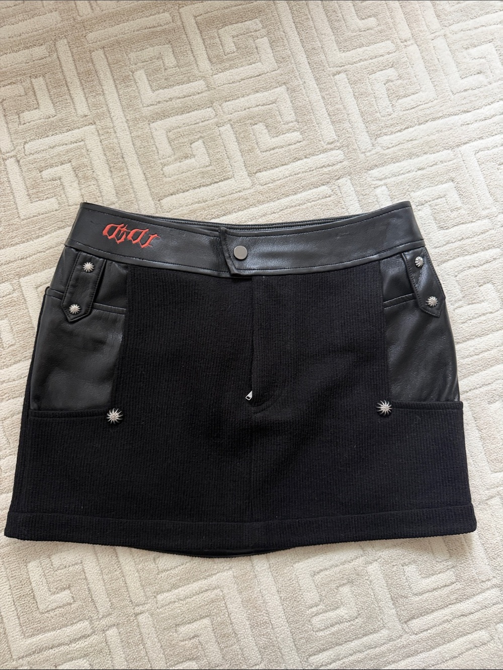 Black Mini Skirt with Leather Trim and Decorative Studs